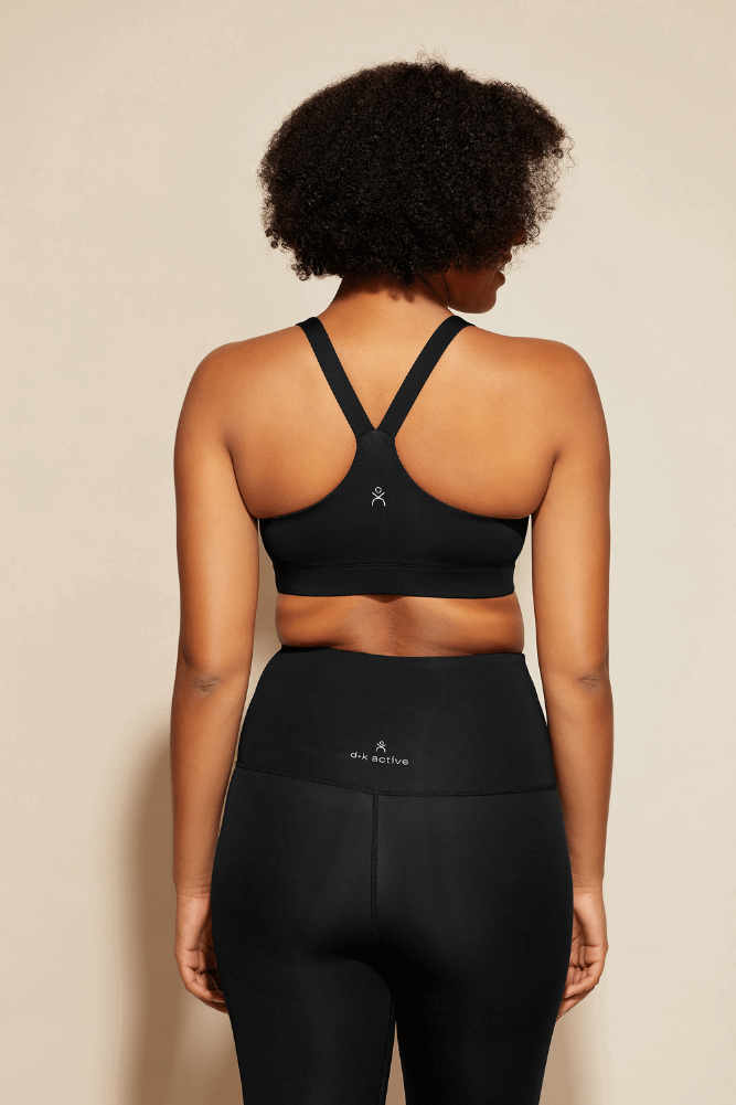 Black racer back Emma sports bra from DK Active stretch technology and uv protection