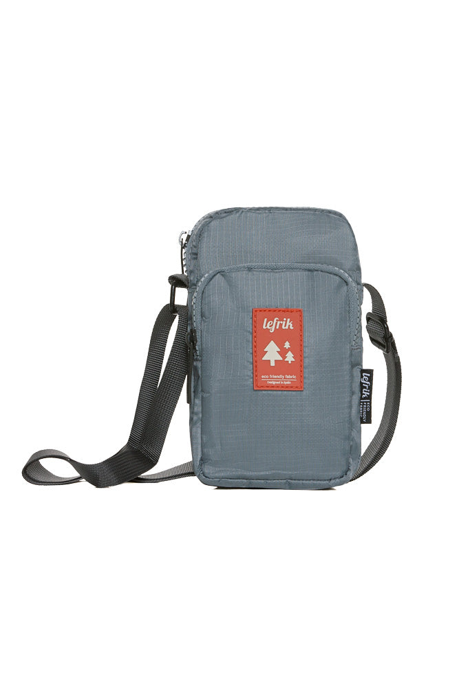 Waterproof Lefrik small blue Amsterdam pack can be worn crossbody front phone pocket with adjustable straps and zips 